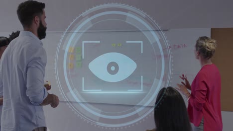 animation of cyber security text and retina scanner over diverse colleagues discussing at office