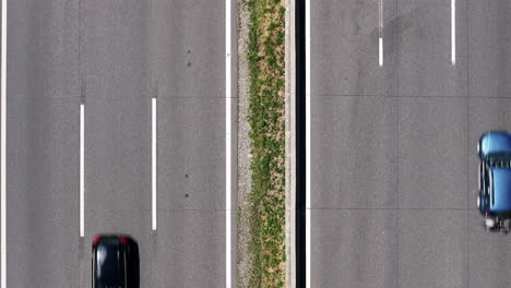 aerial view of a highway with a car driving