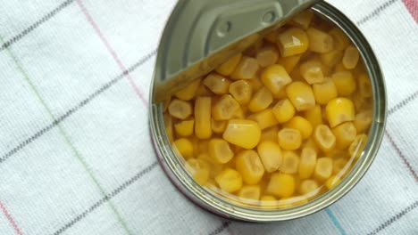 open can of canned corn