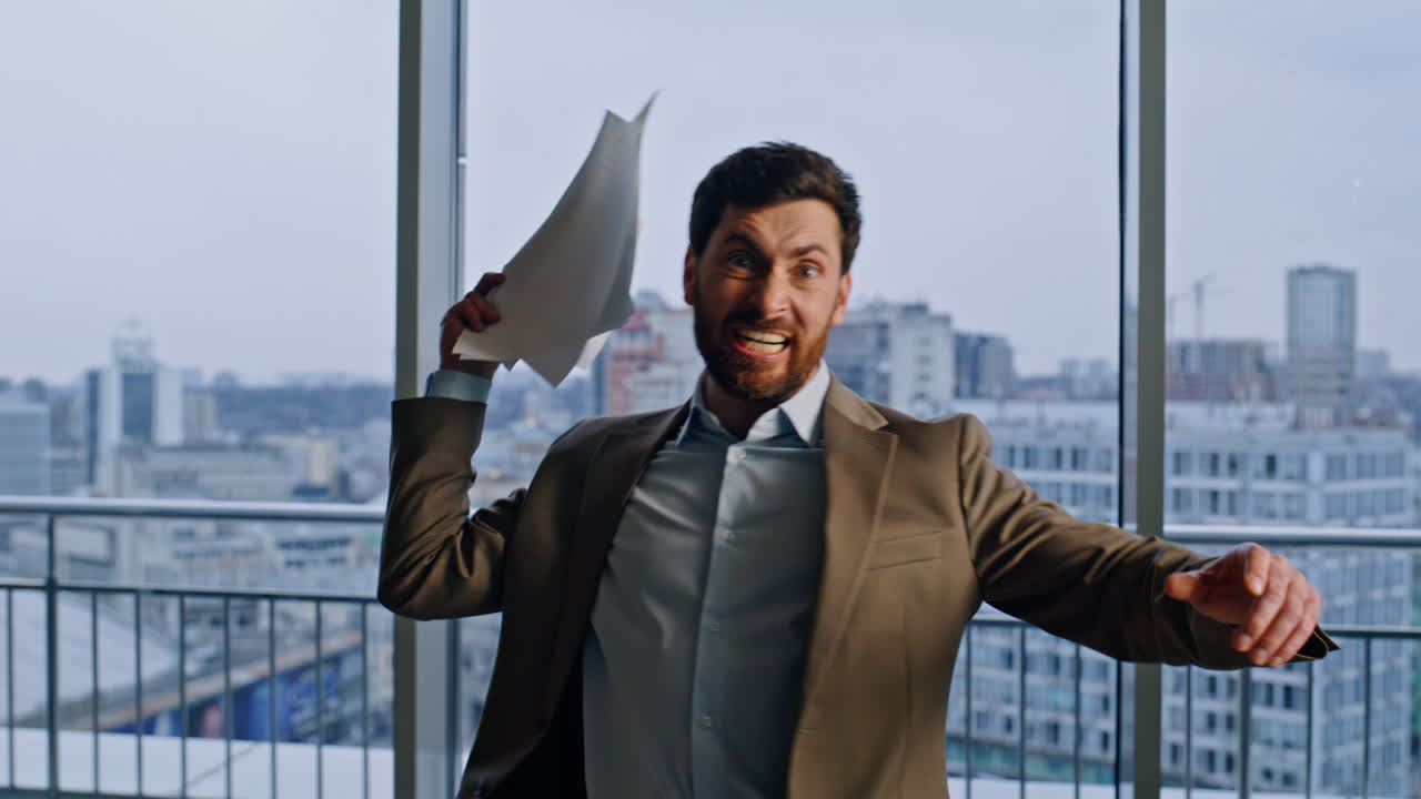 Focused director flipping papers throwing documents cityscape window portrait