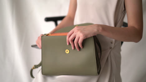 hand open a fashion leather bag