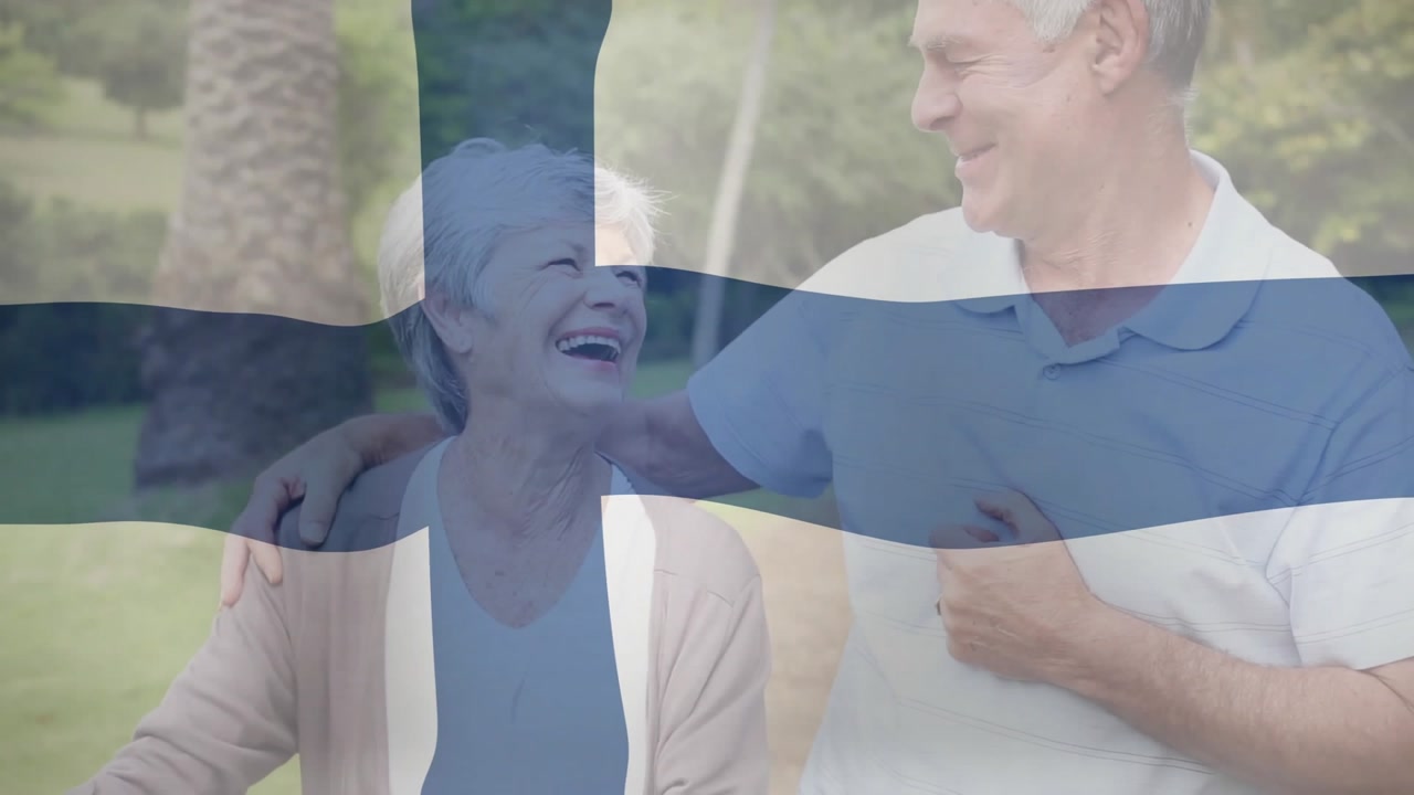 Walking outdoors, elderly couple with Finnish flag animation in background