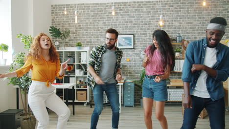 friends dancing in a living room
