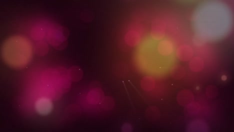 Digitally-generated-video-of-red-&-pink-glowing-spots-moving-against-black-background