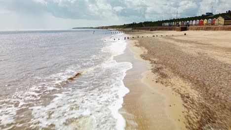 Aerial-Drone-Footage-Along-the-Shoreline-at-Gorleston-On-Sea-Beach,-Norfolk