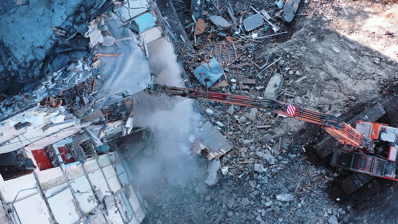 Demolution Destruction an Old House Building. Destroying Old House With Bulldozer Mechanical Arm