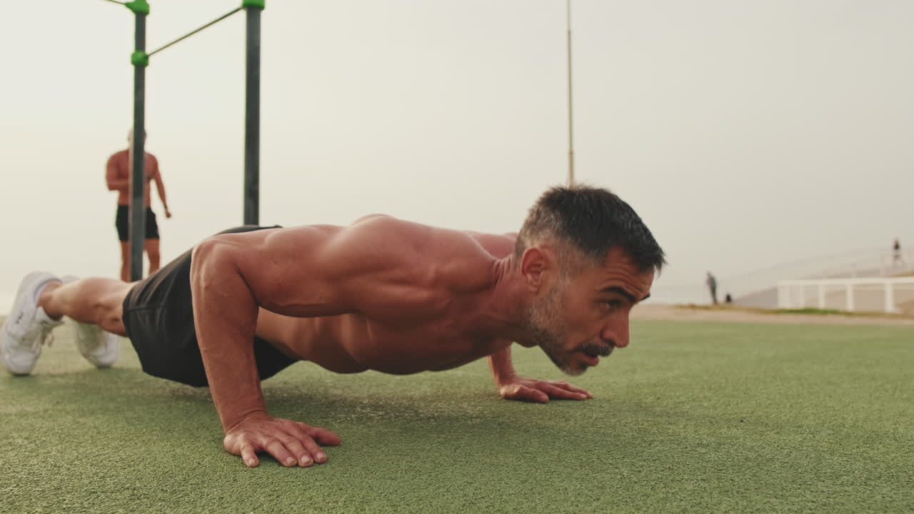 Man doing push-ups outdoors