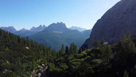 revealing beauty of dolomites in italy with forest and mountains, aerial view