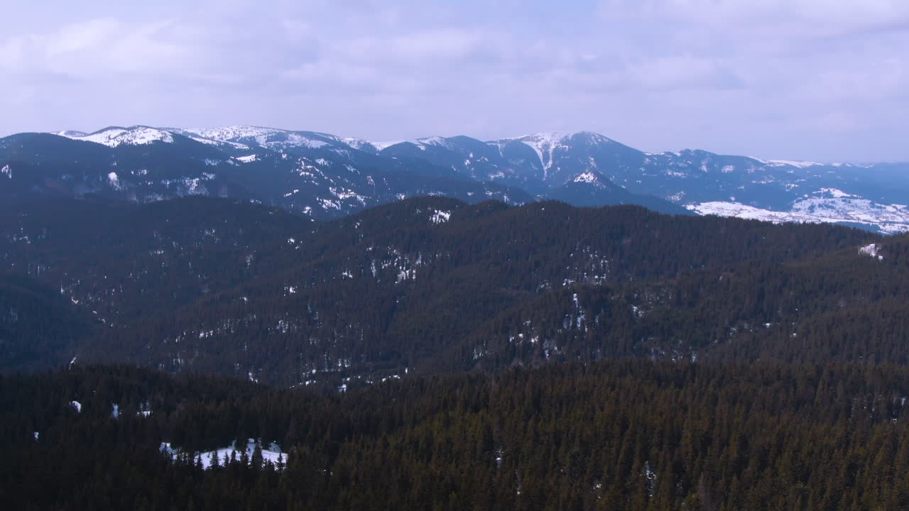 Winter fairy tale shot of snow-covered hut in the forest