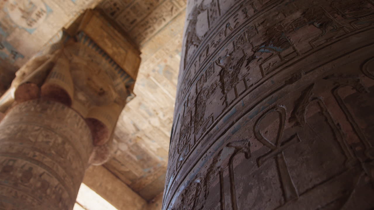 Ancient column carvings in Dendera temple, Egypt, showing hieroglyphic details