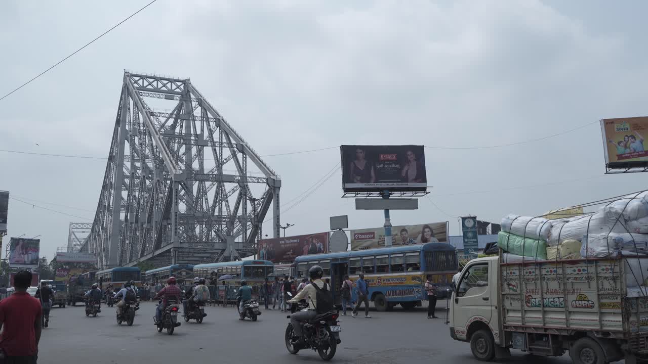 Bustling Urban Street Traffic near Howrah Bridge in Kolkata