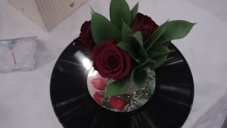 red roses on a vinyl record