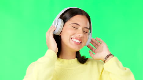 Face,-green-screen-and-woman-with-headphones