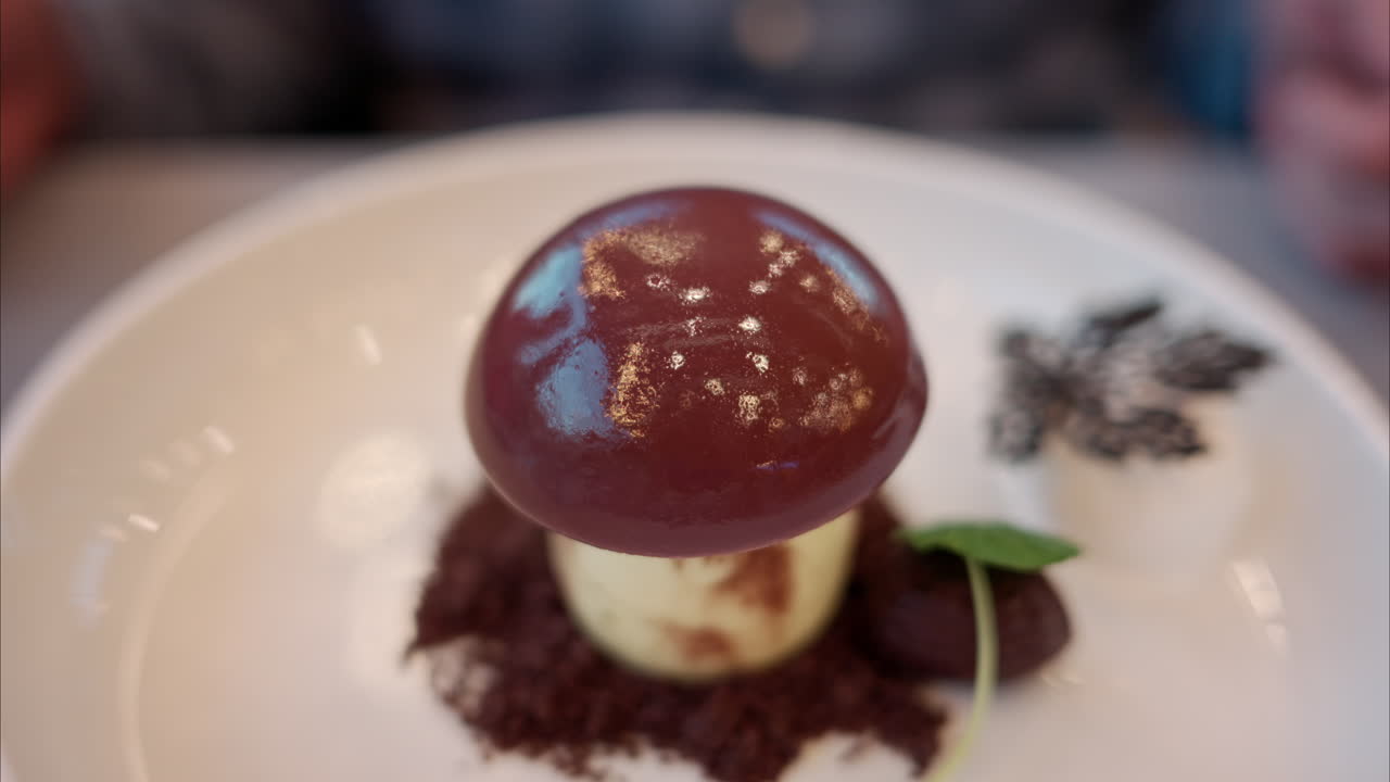 Chocolate mushroom desert on a plate at a restaurant