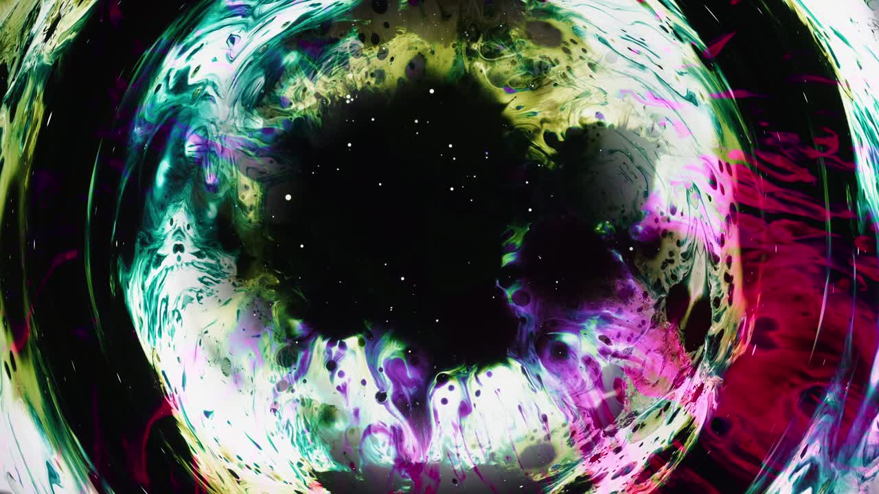 el marco del círculo de salpicaduras de líquido de colorido de tinta giratorio