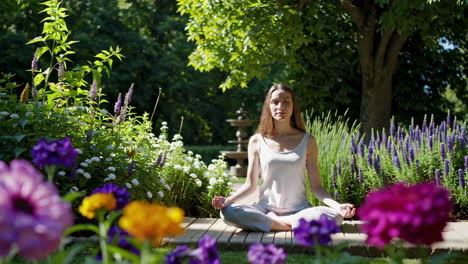 woman meditating in a beautiful garden