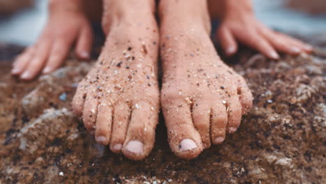 feet of relax woman with sand on the beach enjoy