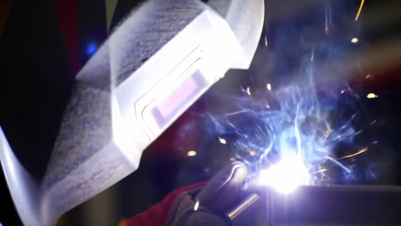 Captivating Moments of Welding: Illuminating Sparks and Precision Craftsmanship in Action as Metal is Shaped and Joined with Expertise