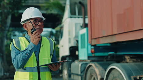 worker communicating at a truck stop