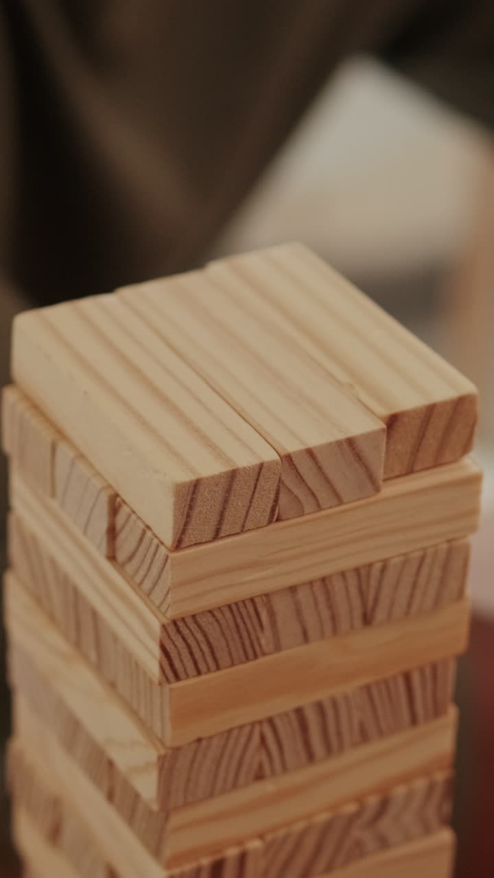 Couple Playing Jenga at Home