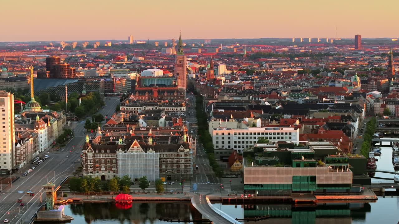 Aerial drone view of the city centre of Copenhagen, Denmark at sunset