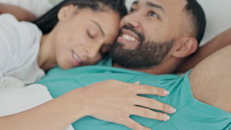 Happy,-talking-and-a-couple-with-a-hug-in-bed