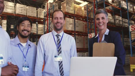 Portrait-of-managers-and-staff-in-a-warehouse-loading-bay-4k