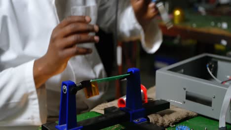 close-up of worker working in glass factory 4k