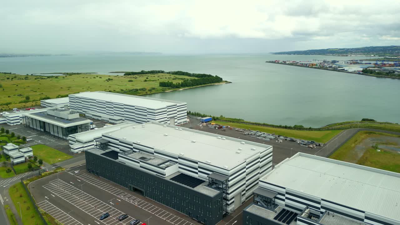 Low travelling aerial video GV of Studio Ulster, a virtual production film studio in Belfast, Northern Ireland, UK. Filmed in 60FPS, 4K and with Rec709 color