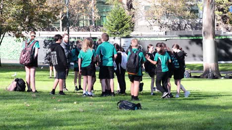 group of children interacting in a garden