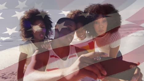 animation of flag of usa over african american couple, son and daughter taking selfie on vacation