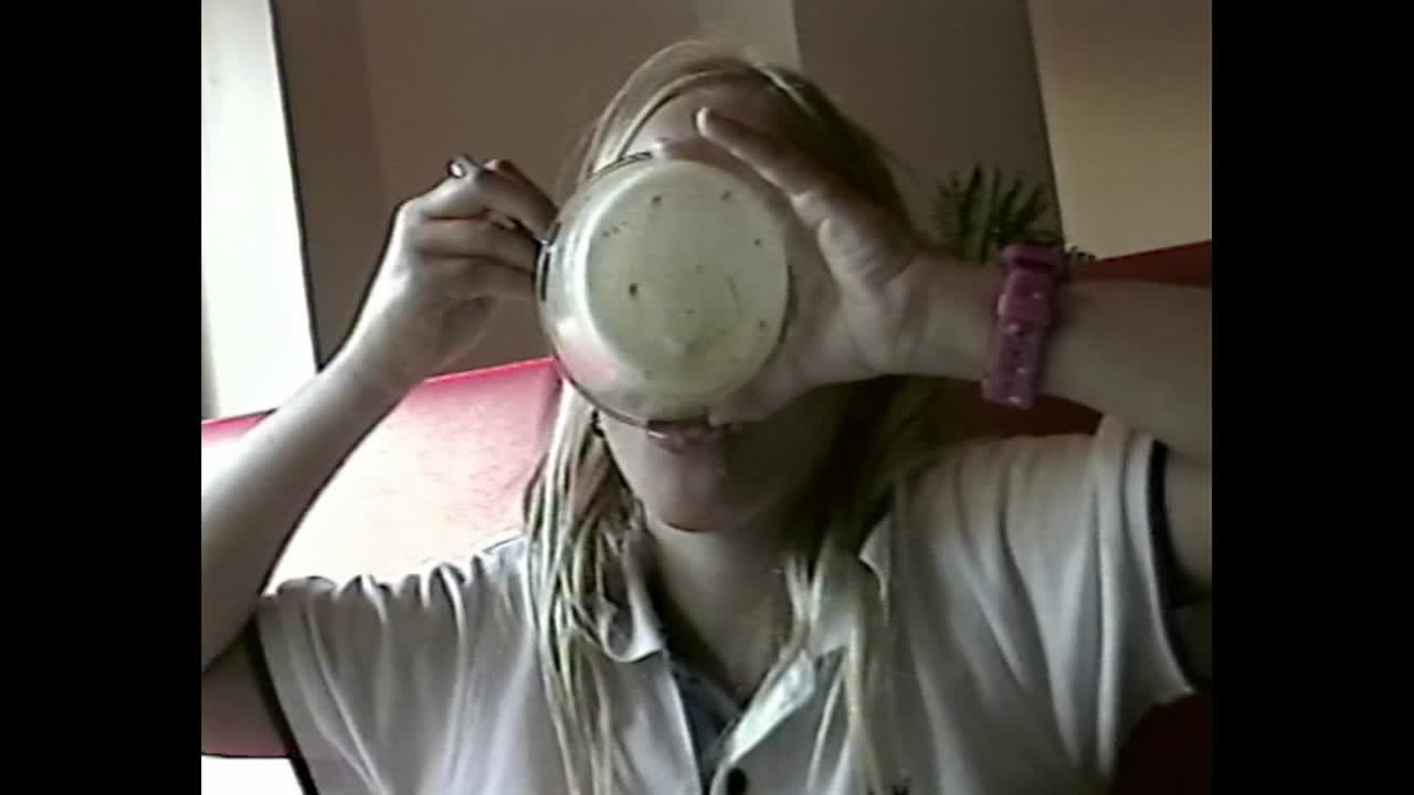 Close-up of girl enjoying tiramisu dessert