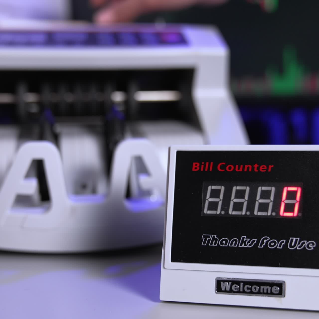 Bank cash counter machine with a stack of dollars. Horizontal view of the finance business money counting. Money and business concept