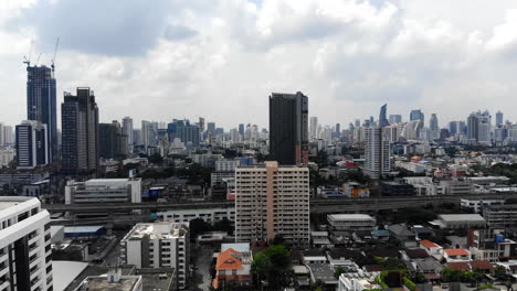 aerial ascending view of bangkok's outskirt