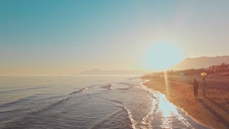 beach sunset with left panning into the ocean waves