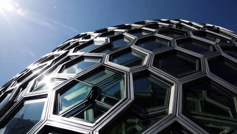 modern building with hexagonal glass facade