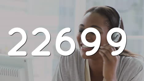 animation of changing numbers over woman wearing phone headset