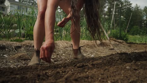 woman farming planting seeds