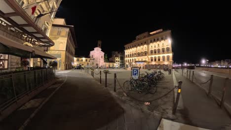 piazza ognissanti at night on the public square in florence, italy. pov shot