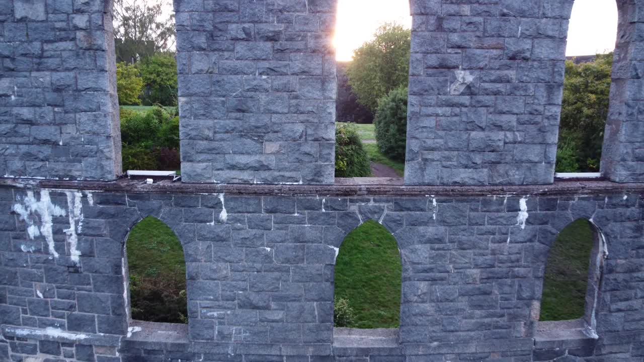 McCaig's Tower and Battery Hill in Oban, Seaside Town on West Coast of Scotland, Aerial 4K HD Footage Fly Out