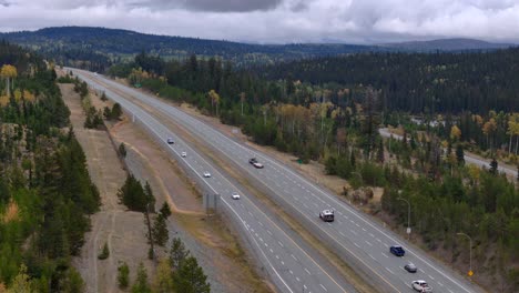 Bird&#039;s-Eye View of Four-Lane Coquihalla Highway Near Kamloops: Cars and Trucks in Motion