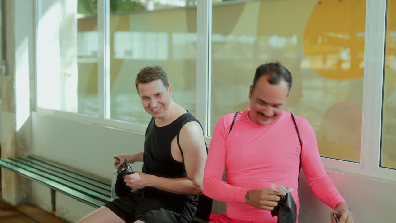 Two Men in Athletic Wear at a Sports Facility