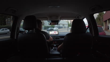 father and son are driving in a car