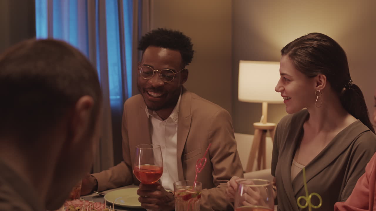 People Chatting at Festive Dinner