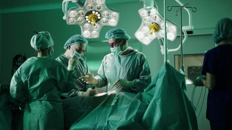 surgical team performing an operation in a sterile operating room