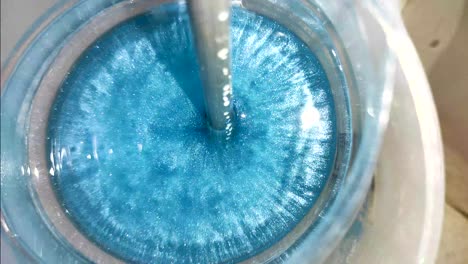 mixing epoxy resin with blue pigment