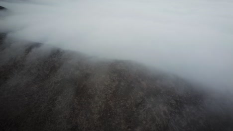 Drone-shot-of-hikers-in-a-misty-mountain-in-Lima-Peru