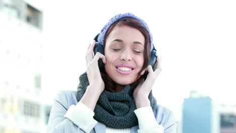 happy woman listening to music