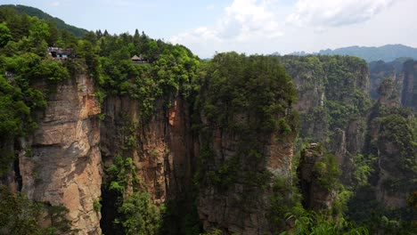 pan right shot of several viewpoints on edge of cliffs to admire yuanjiajie sandstone pillars, china