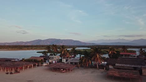 Aerial-wide-angle-dolly-in-at-beautiful-Acapulco-resort-on-sunny-day